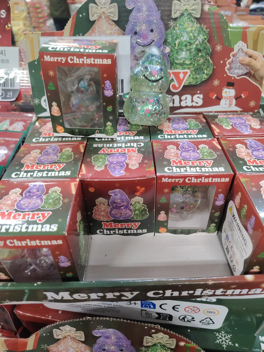 Przezroczysta zabawka antystresowa bałwanek z brokatem w kartonowym opakowaniu Merry Christmas