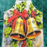 Fartuch świąteczny z motywem dzwonków i ostrokrzewu