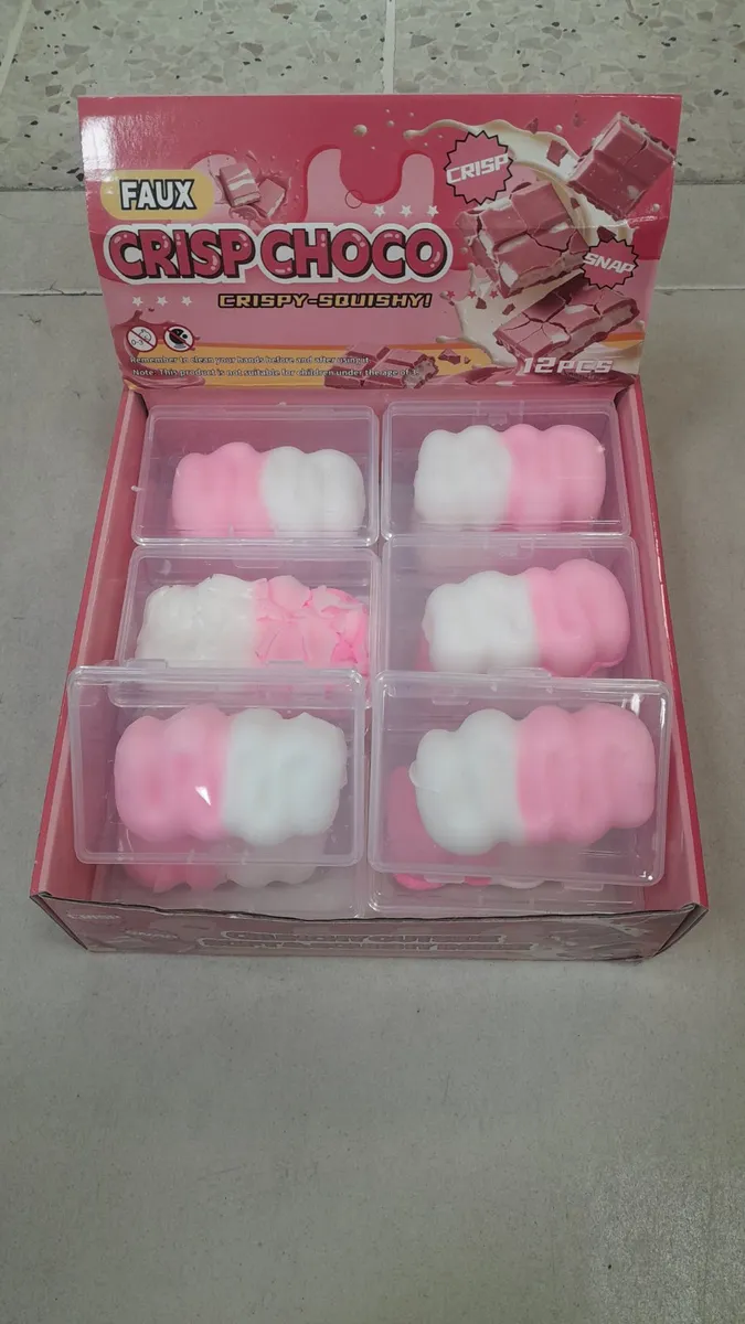 Zestaw 12 różowo-białych squishy w kształcie czekolady w przezroczystych pudełkach