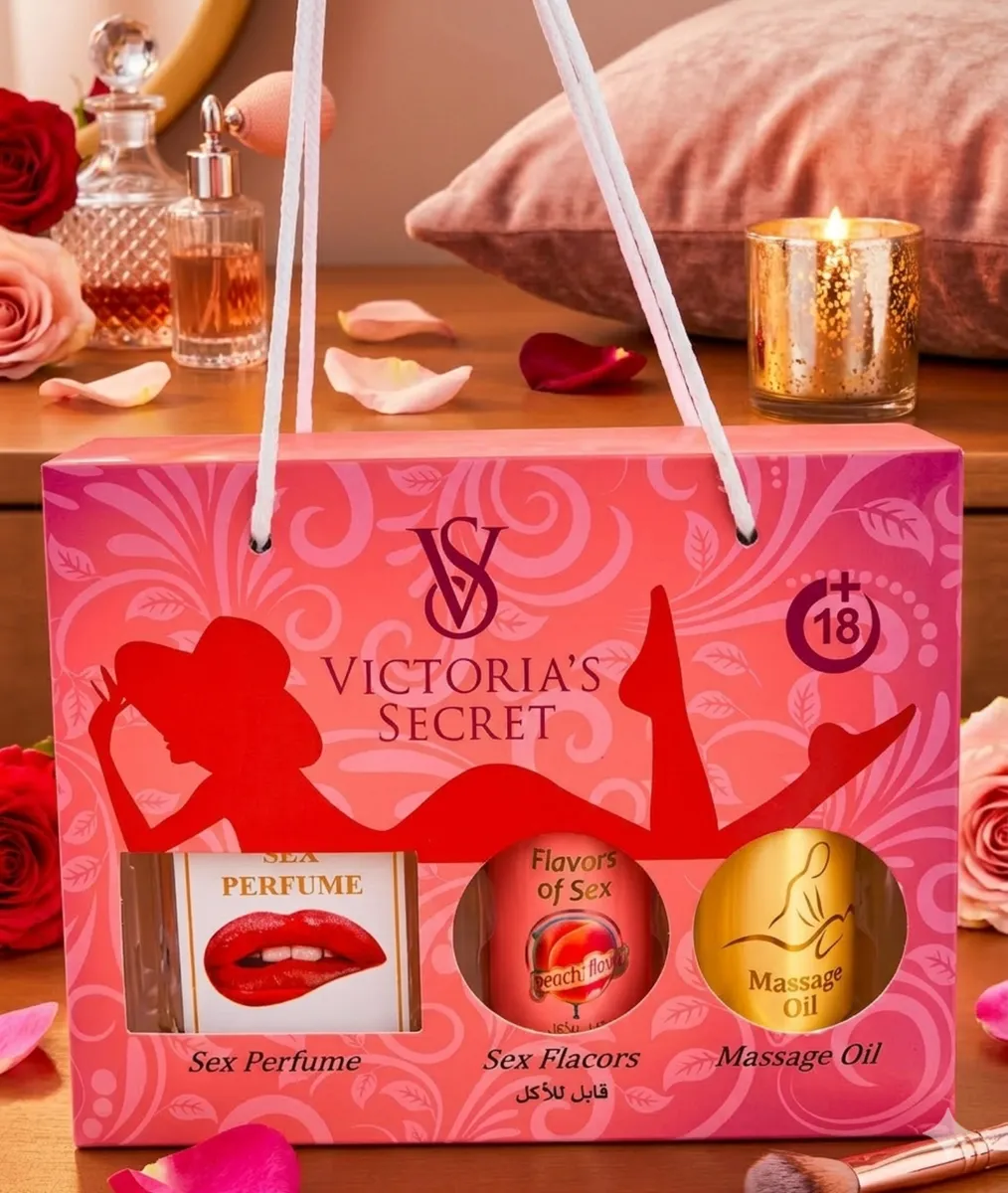 Zestaw prezentowy Victoria's Secret w czerwono-różowym opakowaniu z perfumami, esencją i olejkiem do masażu
