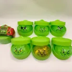 Zielony slime z twarzą Grincha w pojemniku 7 wzorów