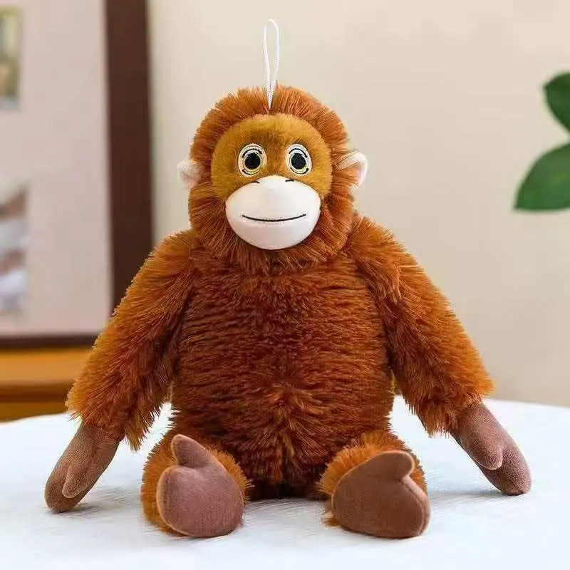 Pluszowa maskotka małpka brązowa z jasnobeżową twarzą i zawieszką 35 cm