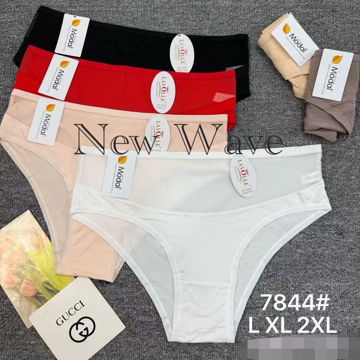 Zestaw majtek damskich w kolorach czarnym, czerwonym, beżowym i białym na szarym tle