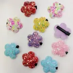 Spinki do włosów kwiatki z cekinami mix kolorów 4 cm