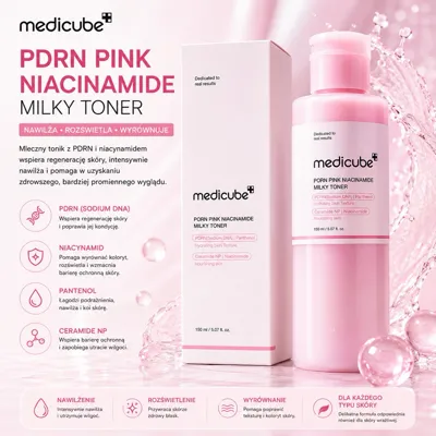 Butelka jasnoróżowego mlecznego toniku Medicube PDRN Pink Niacinamide 150 ml z opakowaniem i różowymi kulkami dekoracyjnymi
