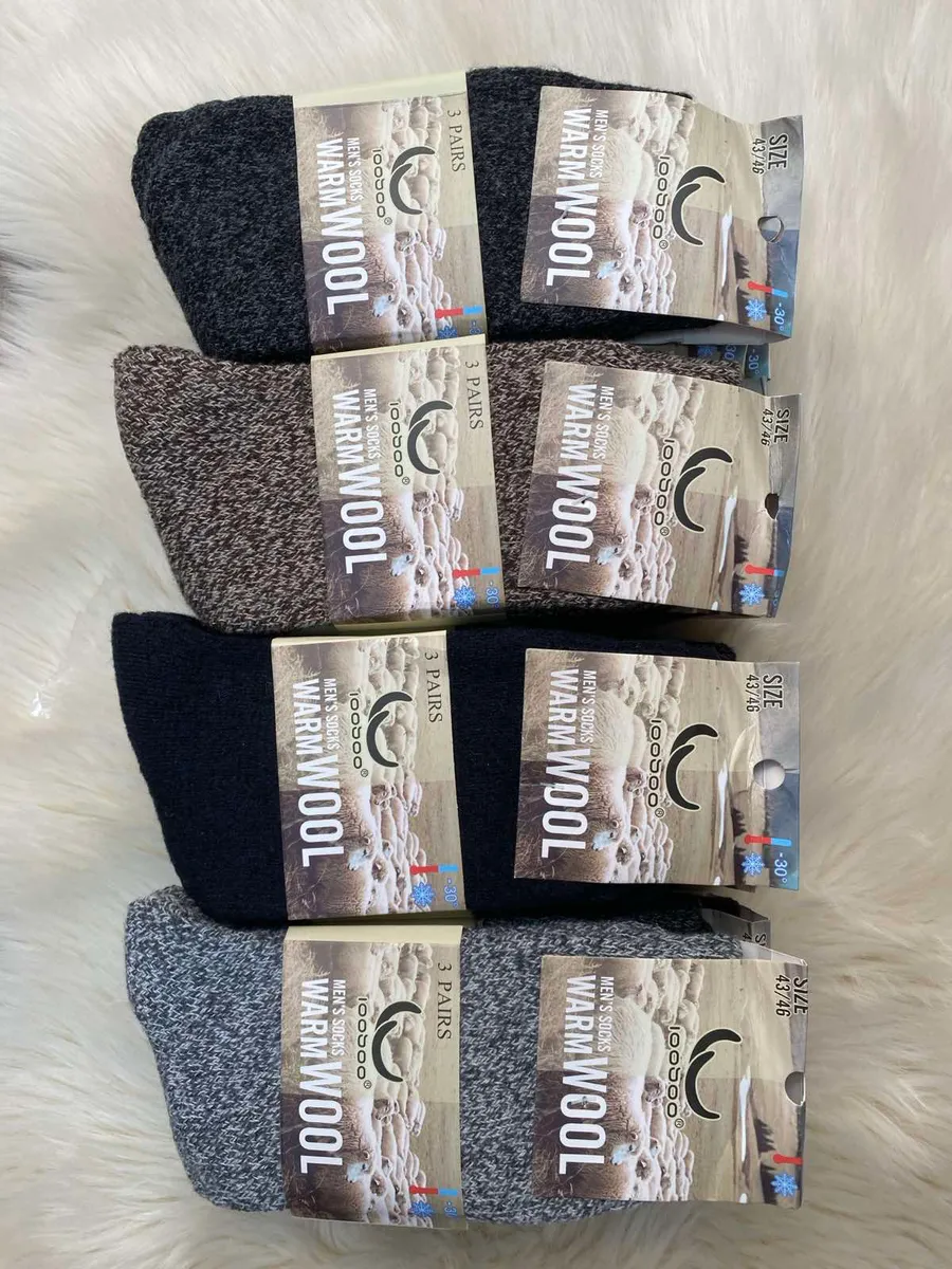 Zestaw czterech opakowań skarpet męskich warm wool w kolorach szary melanż, brązowy melanż, granatowy i jasnoszary melanż