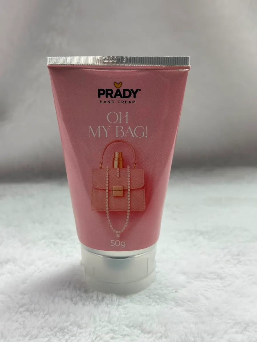 Różowa tubka kremu do rąk Prady Oh My Bag! 50 g z grafiką torebki i pereł