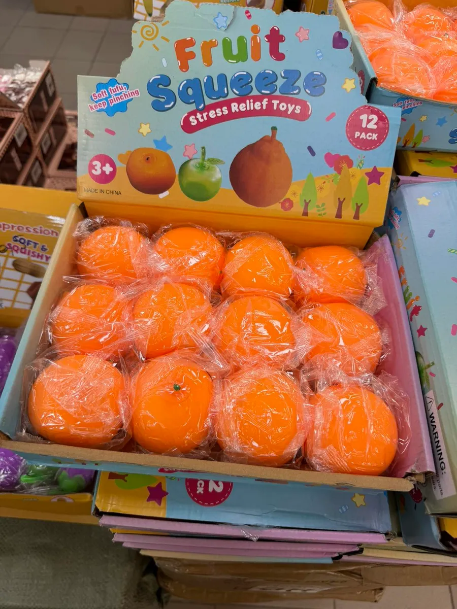 Pomarańczowe zabawki antystresowe Fruit Squeeze w opakowaniu 12 sztuk