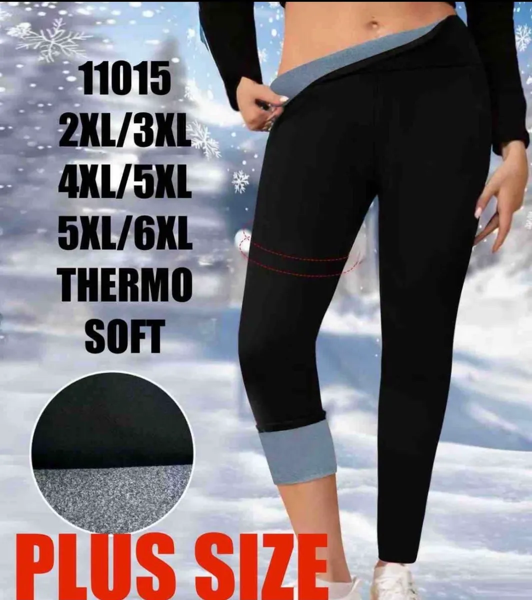 Czarne legginsy damskie plus size z szarym ociepleniem termo soft na modelce