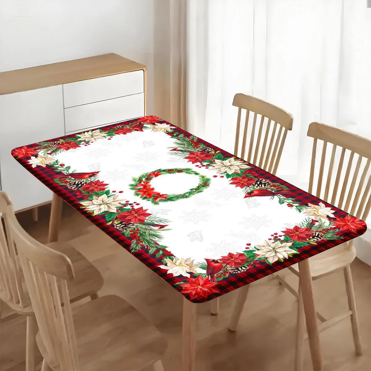 Obrus świąteczny 60x120 cm z czerwonymi i kremowymi poinsecjami oraz zielonym wieńcem na białym tle