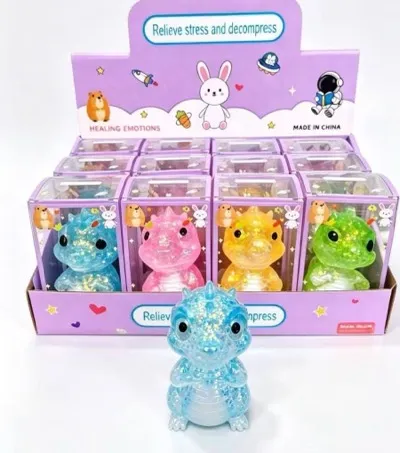 Figurki antystresowe dinozaury w przezroczystych pudełkach, kolory niebieski, różowy, żółty, zielony, opakowanie zbiorcze fio