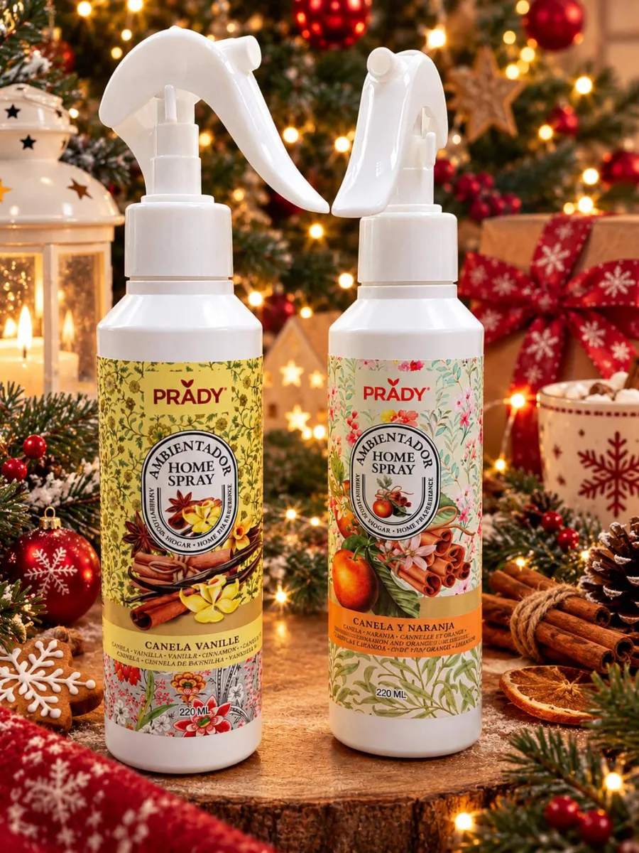Dwa białe spraye do pomieszczeń Prady 220 ml z kolorowymi etykietami o zapachu cynamonu i wanilii oraz cynamonu i pomarańczy