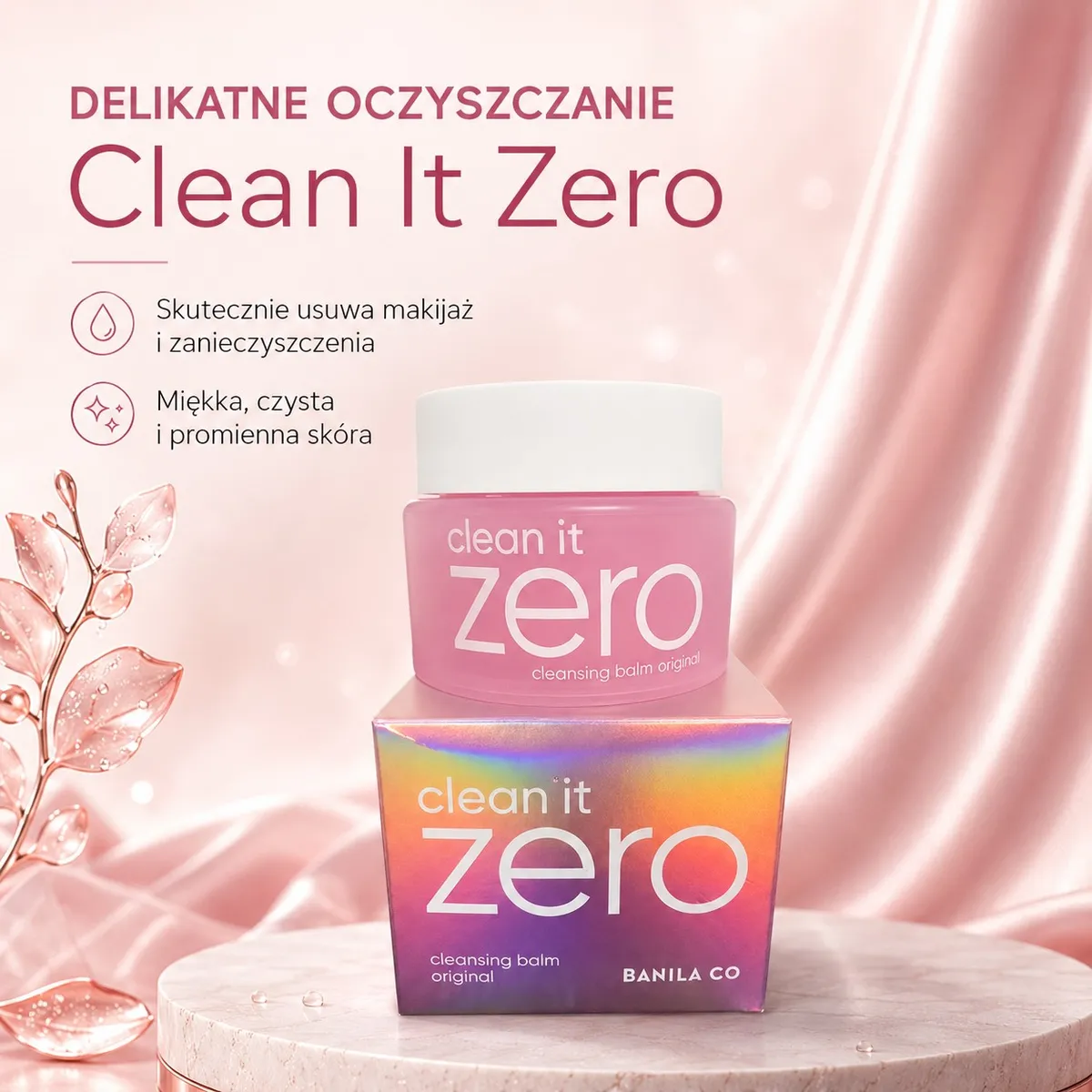 różowy słoik balsamu do demakijażu Clean It Zero na holograficznym pudełku na tle różowego jedwabiu