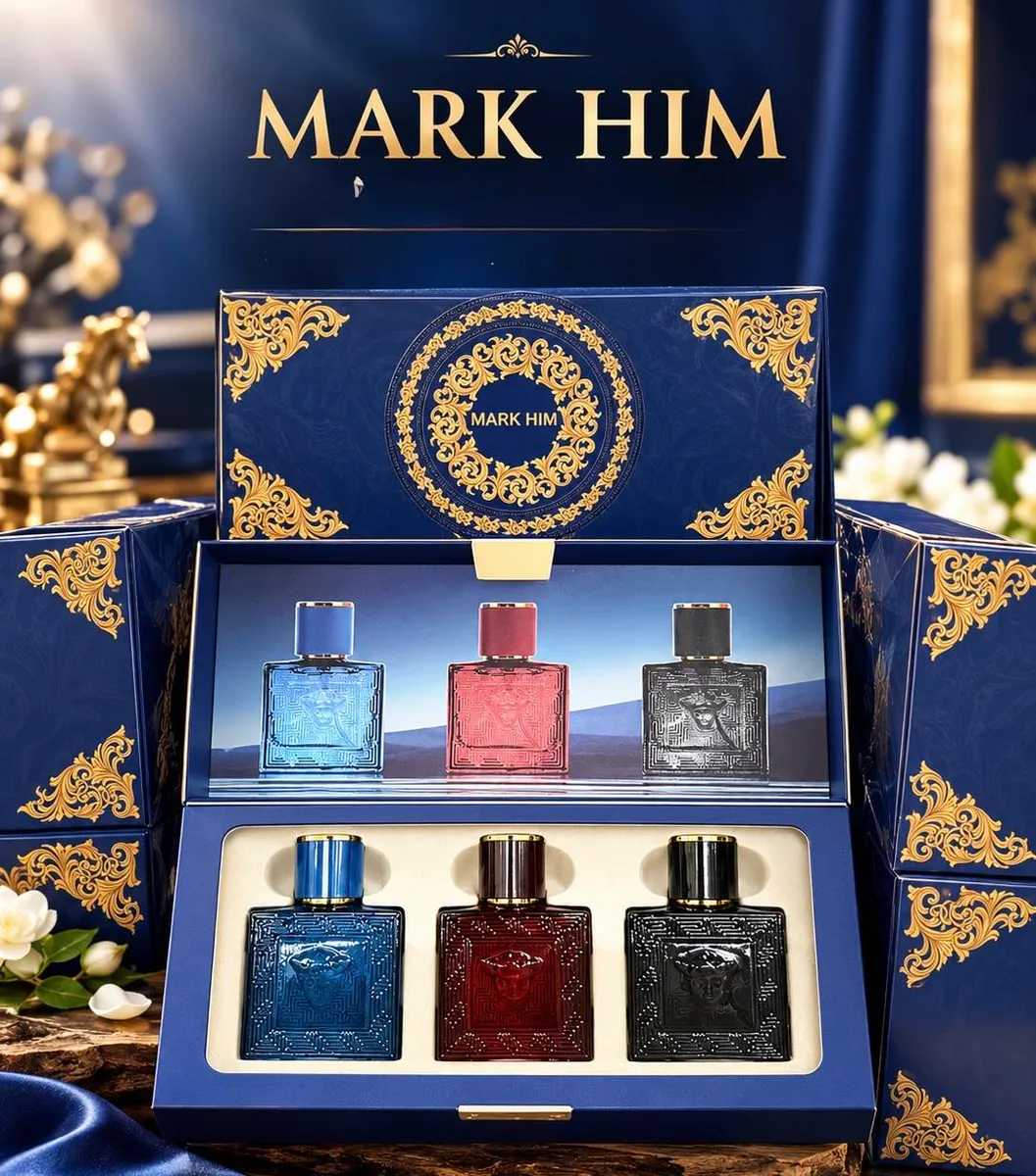 Zestaw trzech męskich perfum Mark Him w granatowym pudełku z złotymi ornamentami