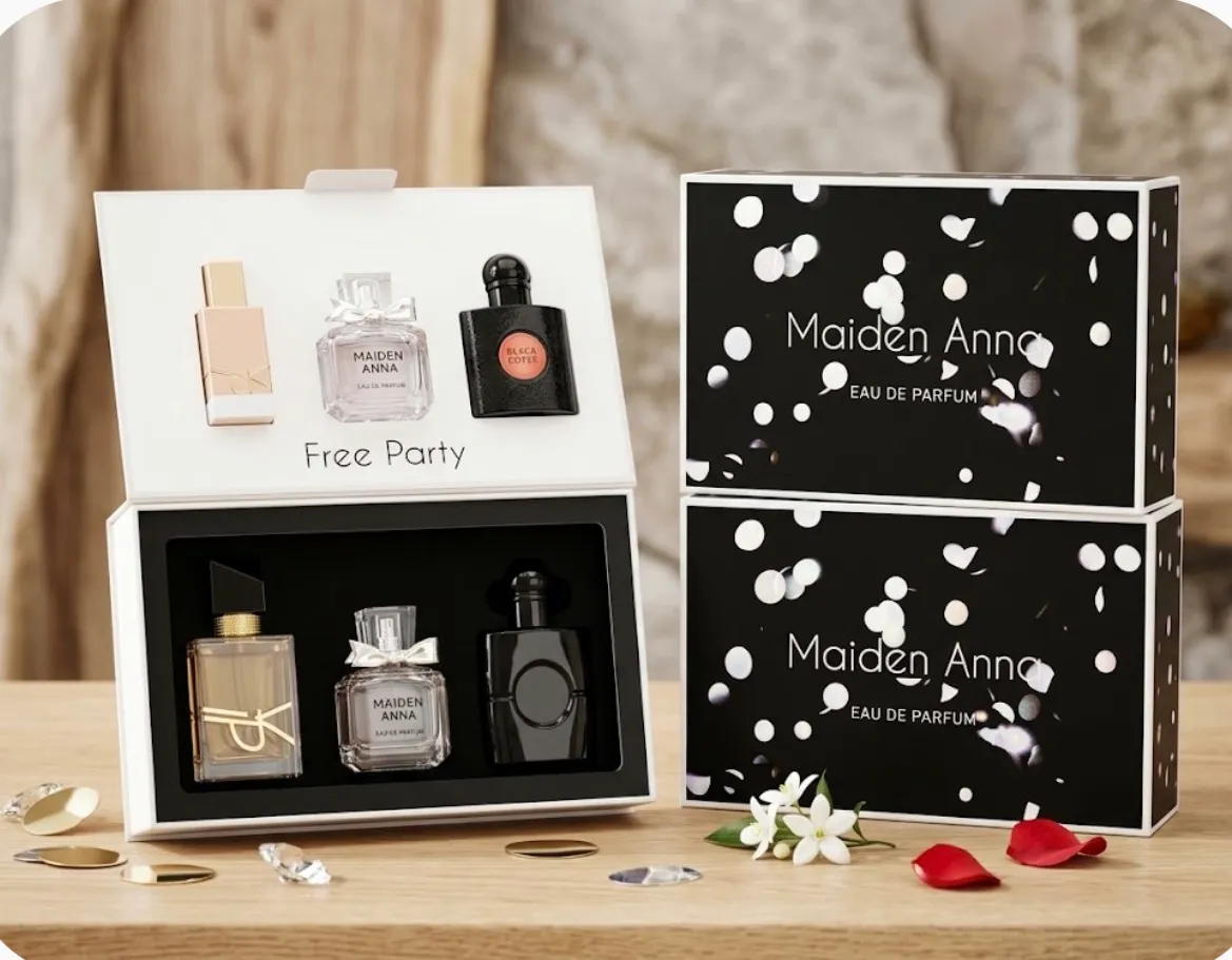 Zestaw trzech perfum Maiden Anna w czarnym opakowaniu z białymi konfetti na drewnianym stole