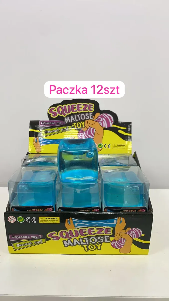 Przezroczysta niebieska kostka antystresowa w opakowaniu zbiorczym 12 sztuk