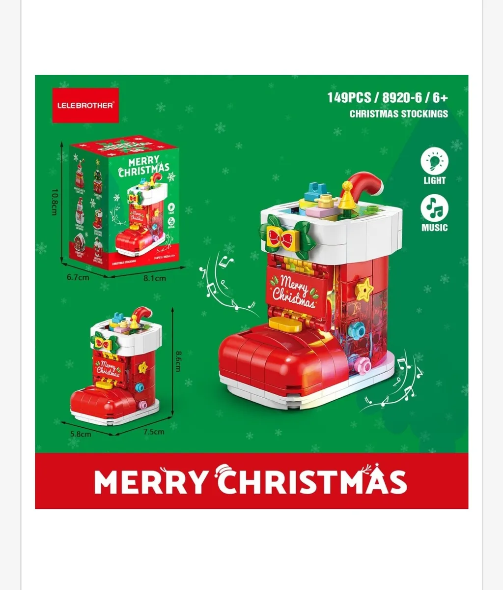 Czerwono-biała skarpeta świąteczna z klocków z napisem Merry Christmas, kokardą, światłem i muzyką